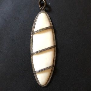 Diamond Pave and Bone Pendant.